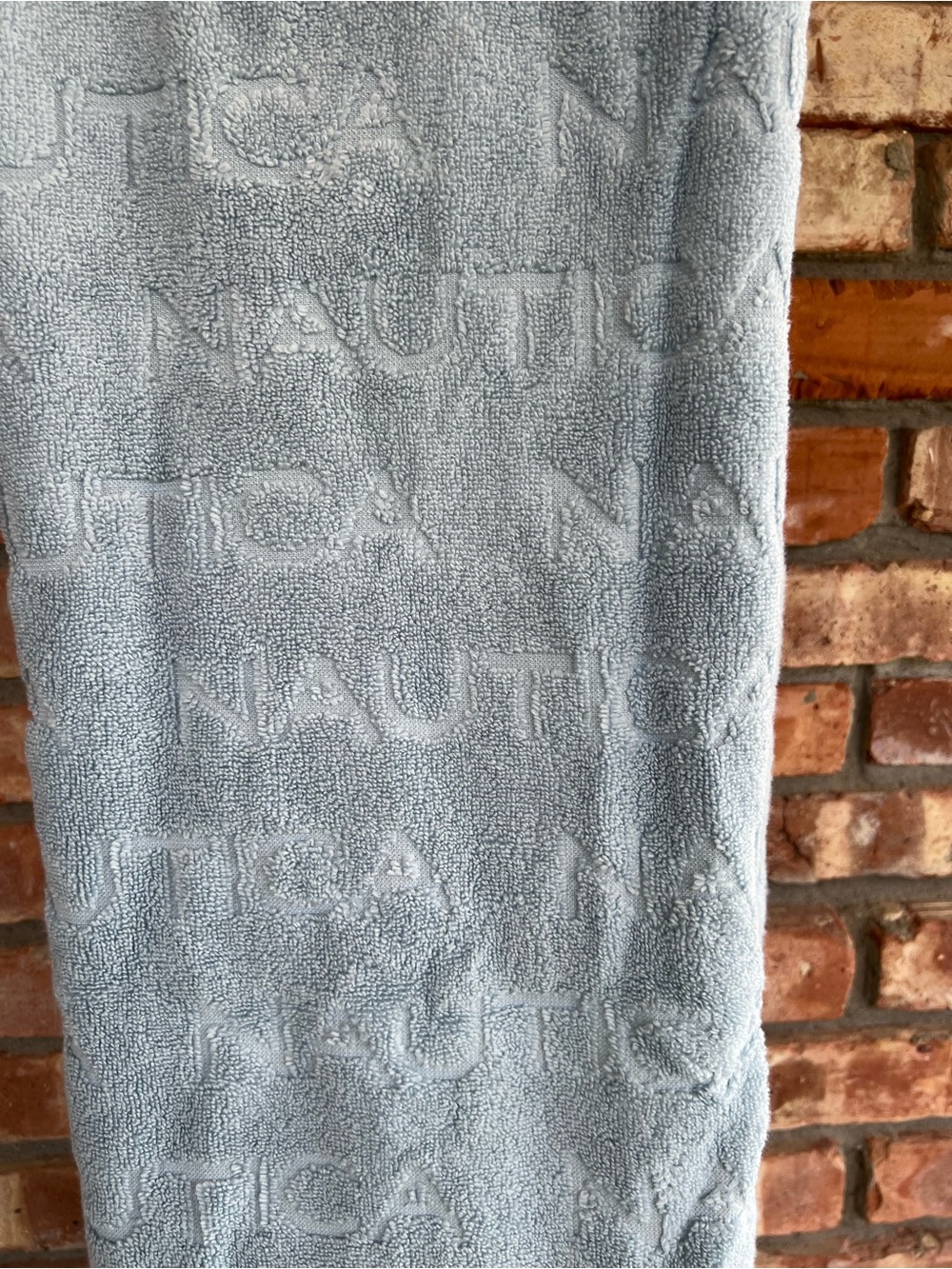 Nautica Pale Blue Embossed Logo Bath Towel